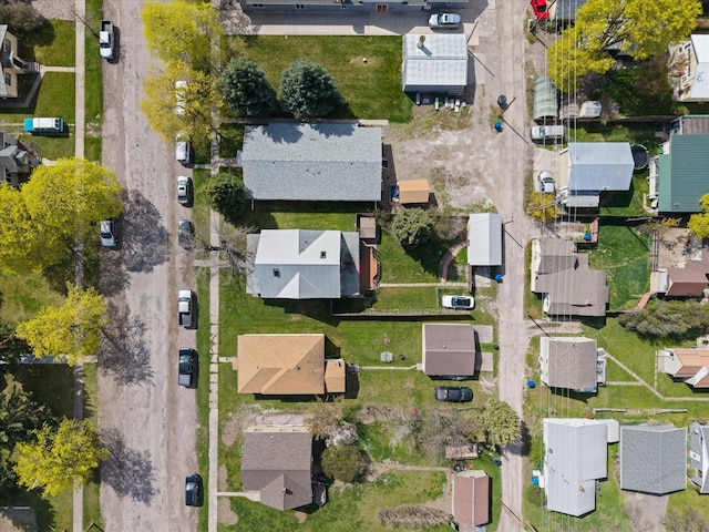 birds eye view of property with a residential view