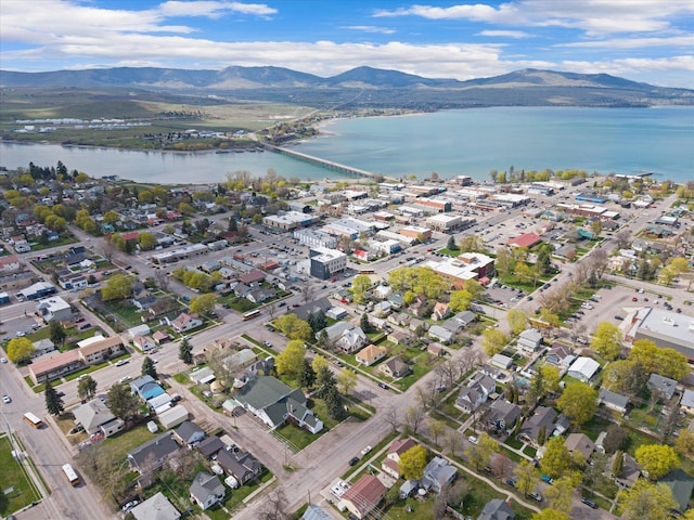 aerial view featuring a water and mountain view