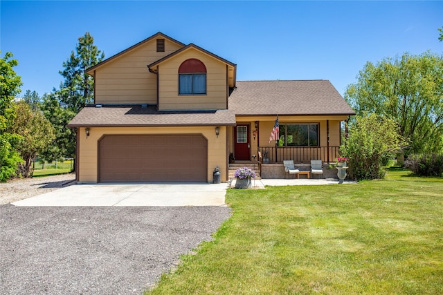 19720 Leo Hansen Rd, Florence, MT 59833 - tri-level home with an attached garage, roof with shingles, covered porch, and a front yard
