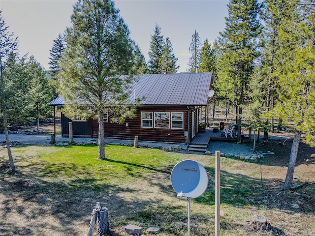 exterior space featuring a yard and a deck