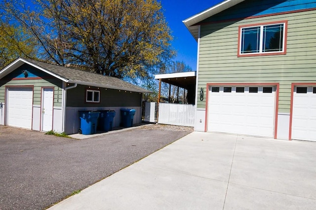 garage featuring driveway
