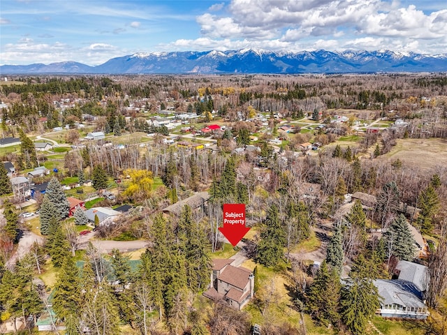 drone / aerial view with a mountain view and a residential view