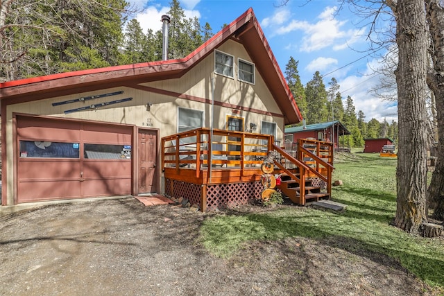 17 S Main St, Neihart, MT 59465 - rear view of property featuring a yard and a deck