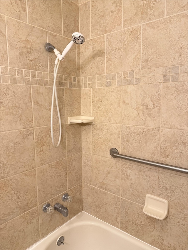 full bath featuring shower / bathtub combination