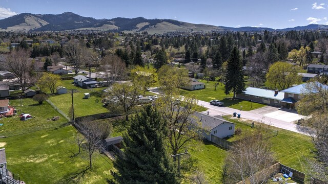 drone / aerial view featuring a mountain view