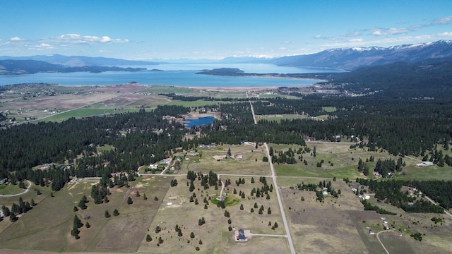34051 Ridge Rd, Polson, MT 59860 - drone / aerial view featuring a water and mountain view