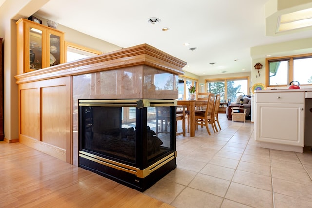 34051 Ridge Rd, Polson, MT 59860 - interior details with visible vents, a high end fireplace, and recessed lighting