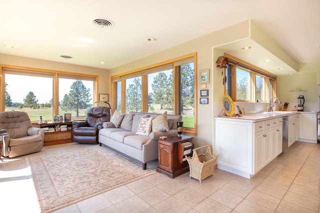 34051 Ridge Rd, Polson, MT 59860 - living area featuring recessed lighting, light tile patterned flooring, and visible vents