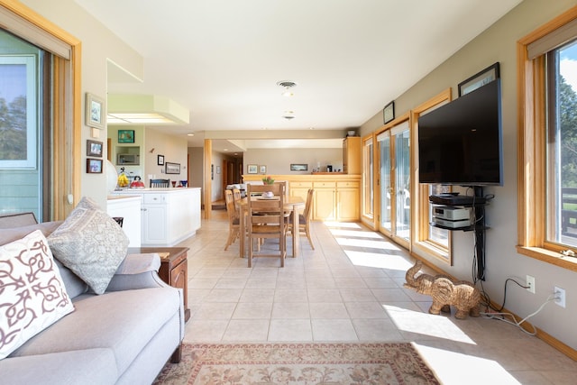 34051 Ridge Rd, Polson, MT 59860 - living room with baseboards, plenty of natural light, and light tile patterned floors