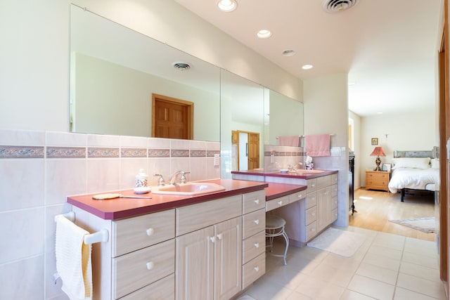34051 Ridge Rd, Polson, MT 59860 - bathroom with connected bathroom, tile walls, tile patterned floors, and visible vents