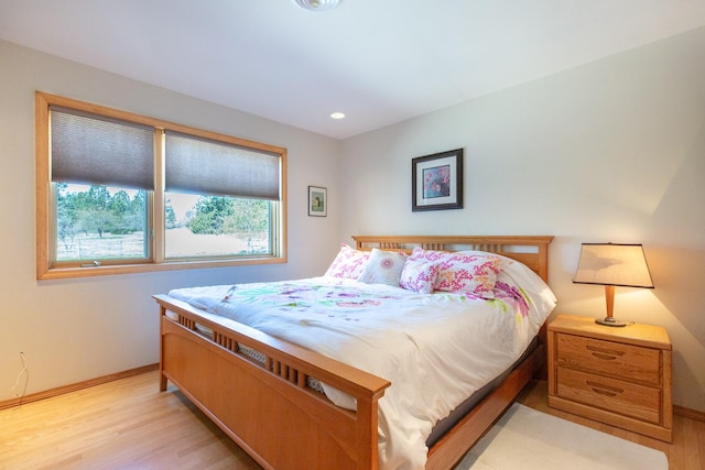 34051 Ridge Rd, Polson, MT 59860 - bedroom with light wood-style floors, baseboards, and recessed lighting