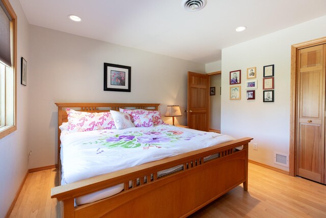 34051 Ridge Rd, Polson, MT 59860 - bedroom featuring recessed lighting, light wood-type flooring, and visible vents