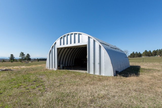 34051 Ridge Rd, Polson, MT 59860 - view of pole building featuring a yard and a rural view