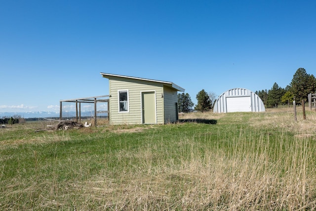 34051 Ridge Rd, Polson, MT 59860 - view of yard with a garage and an outdoor structure