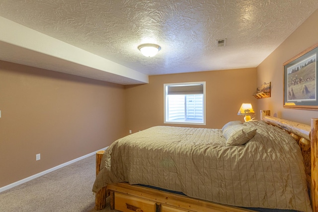 200 37th Ave NE, Great Falls, MT 59404 - carpeted bedroom featuring visible vents, a textured ceiling, and baseboards