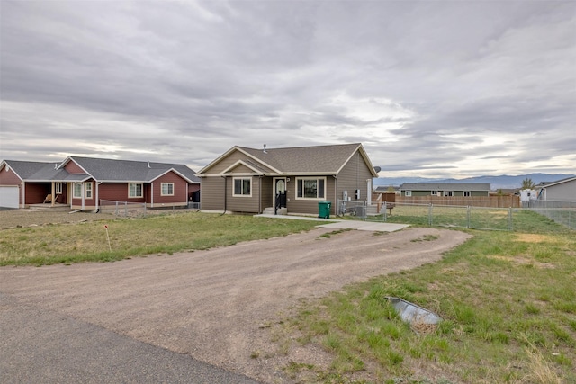817 Vega Rd, Helena, MT 59602 - view of front of house featuring fence and a front yard