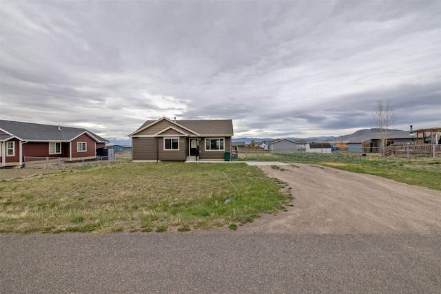817 Vega Rd, Helena, MT 59602 - view of front facade with fence and dirt driveway