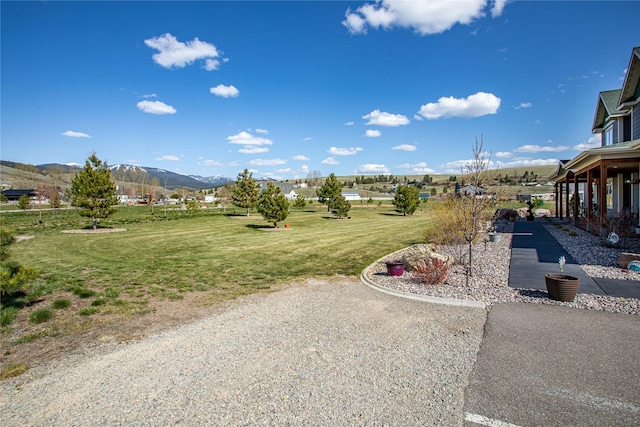 exterior space featuring a mountain view