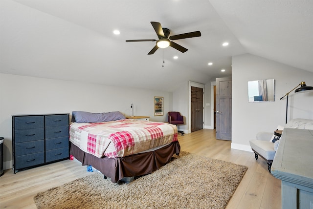 bedroom featuring lofted ceiling, baseboards, ceiling fan, recessed lighting, and light wood-style flooring