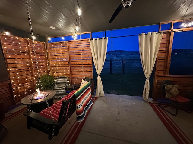 view of patio / terrace featuring fence
