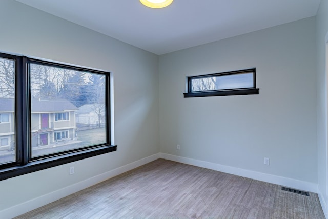 2214 S 12th St W, Missoula, MT 59801 - empty room featuring baseboards and wood finished floors
