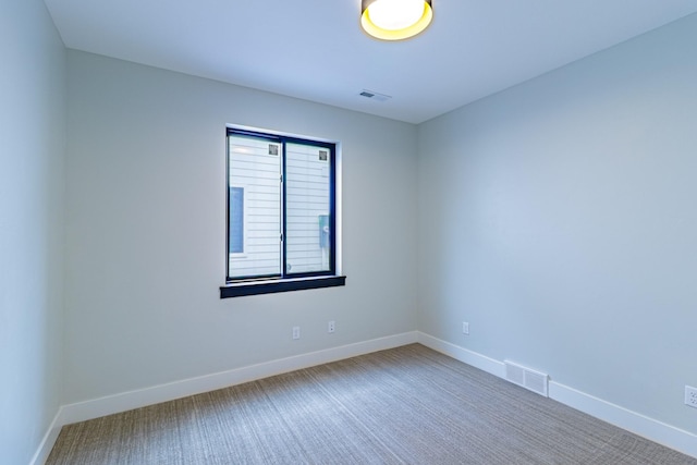 2214 S 12th St W, Missoula, MT 59801 - spare room featuring carpet and baseboards