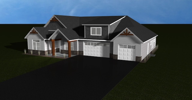 view of front of property featuring aphalt driveway, a front yard, and stone siding