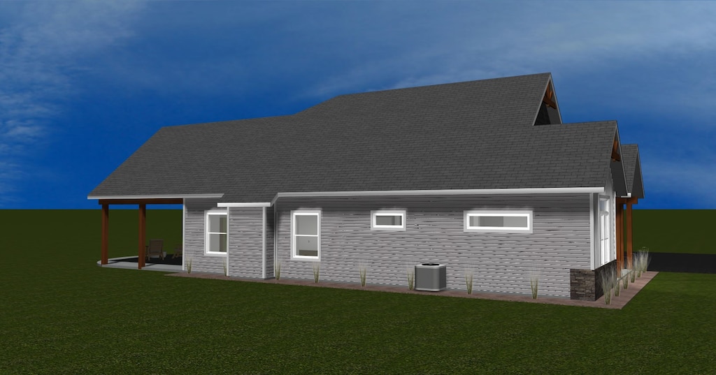 1066 Lake Pointe Dr, Bigfork, MT 59911 - back of property featuring a lawn, stone siding, and a shingled roof