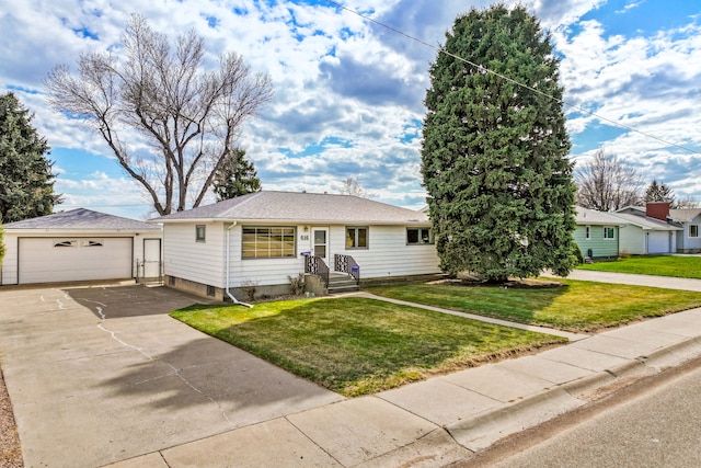416 Riverview Dr E, Great Falls, MT 59404 - view of front of home with a detached garage, an outdoor structure, and a front lawn