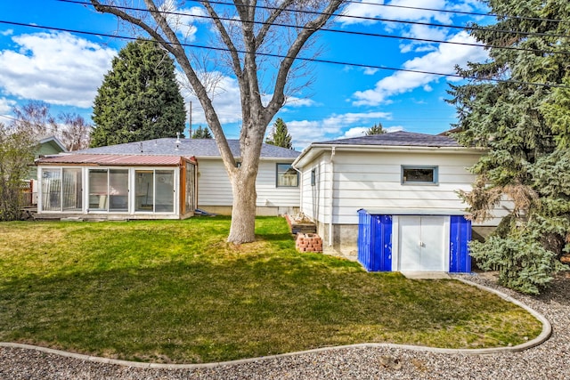 416 Riverview Dr E, Great Falls, MT 59404 - back of property with a yard and a sunroom