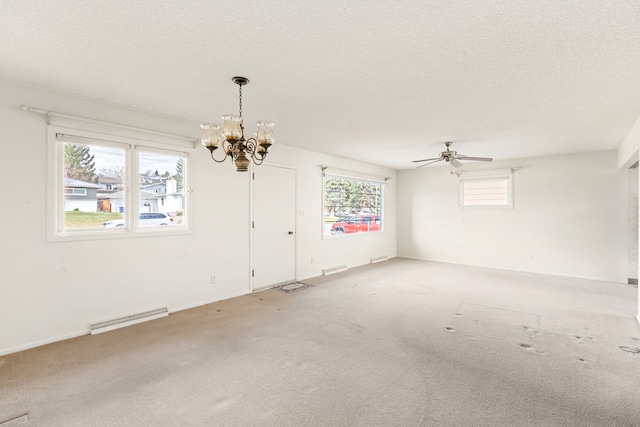 416 Riverview Dr E, Great Falls, MT 59404 - unfurnished room featuring carpet, ceiling fan with notable chandelier, a textured ceiling, and visible vents