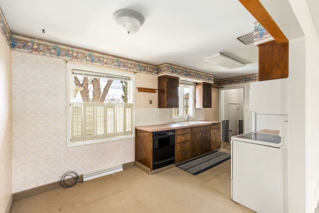 416 Riverview Dr E, Great Falls, MT 59404 - kitchen featuring a sink, black dishwasher, light carpet, and wallpapered walls