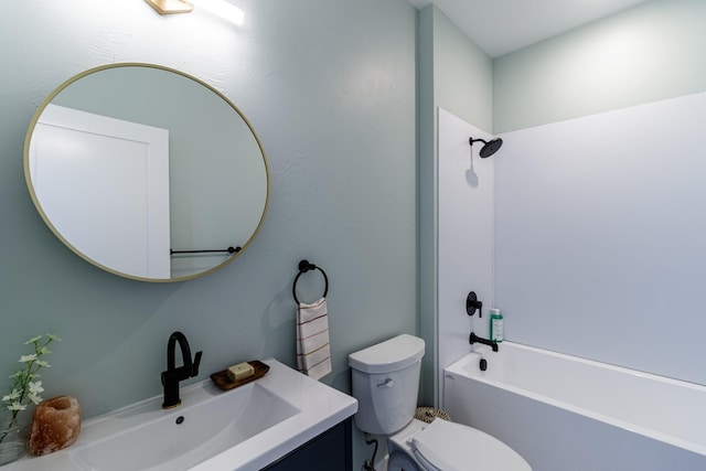 full bathroom with vanity, washtub / shower combination, and toilet