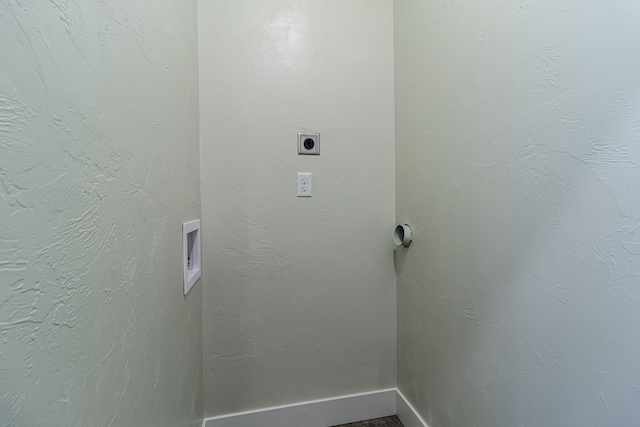 laundry room featuring washer hookup, electric dryer hookup, baseboards, and laundry area
