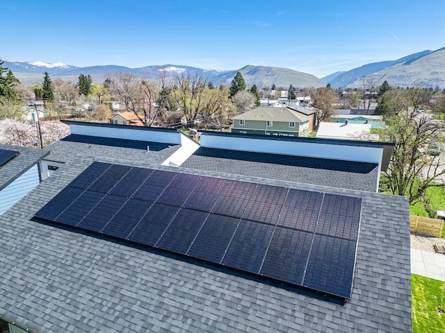 2216 S 12th St W, Missoula, MT 59801 - exterior view of a shingled roof and a mountain view