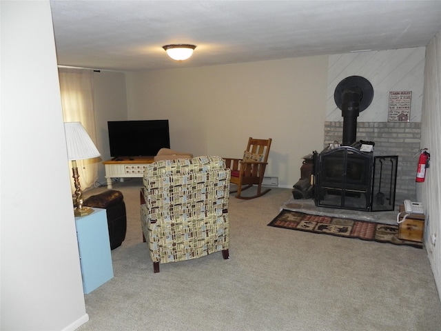 carpeted living room featuring a wood stove