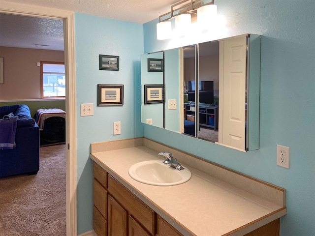 329 35th Ave NE, Great Falls, MT 59404 - bathroom featuring vanity and a textured ceiling