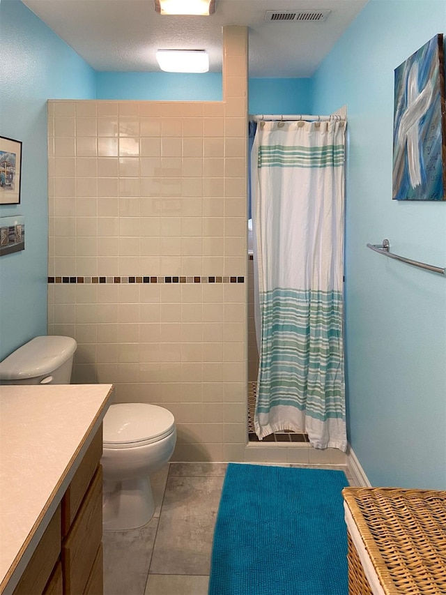 329 35th Ave NE, Great Falls, MT 59404 - bathroom with vanity, a shower with curtain, and tile patterned flooring