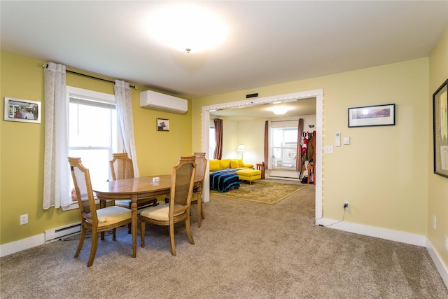 111 6th Ave W, Polson, MT 59860 - carpeted dining room featuring baseboards, a wall unit AC, and a baseboard radiator