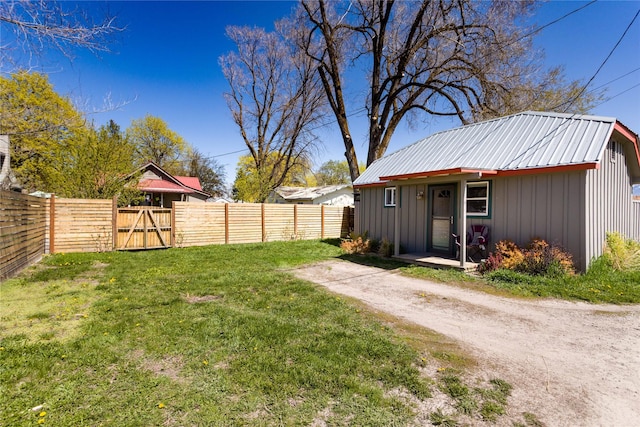 111 6th Ave W, Polson, MT 59860 - view of yard featuring a fenced backyard and a gate