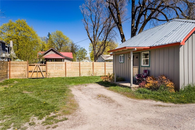 111 6th Ave W, Polson, MT 59860 - view of yard with a gate, an outbuilding, and fence private yard