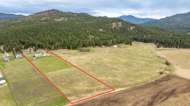 290 Browns Meadow Rd, Kila, MT 59920 - birds eye view of property featuring a mountain view, a rural view, and a forest view