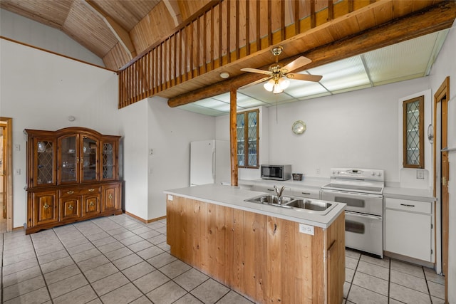 290 Browns Meadow Rd, Kila, MT 59920 - kitchen featuring ceiling fan, a sink, white appliances, light countertops, and light tile patterned floors