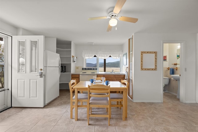 290 Browns Meadow Rd, Kila, MT 59920 - dining space featuring a ceiling fan and light tile patterned floors