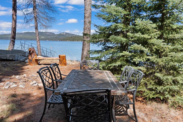 view of patio / terrace with a water view