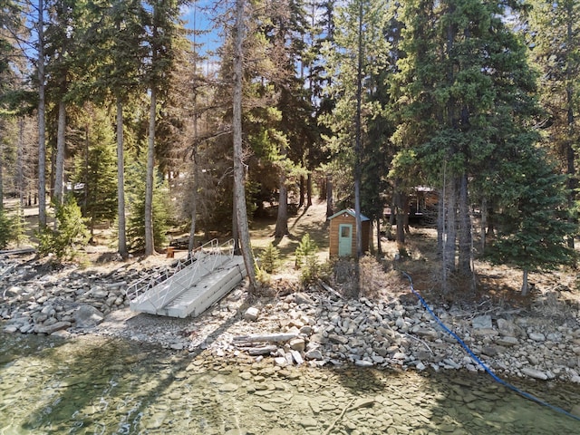 560 Mcgregor Ln, Marion, MT 59925 - view of yard with a storage shed and an outdoor structure