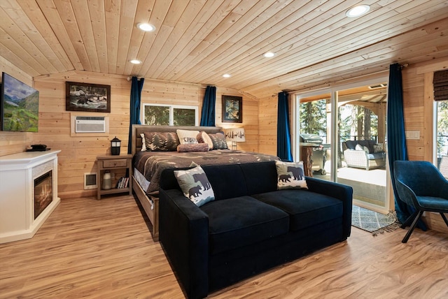 560 Mcgregor Ln, Marion, MT 59925 - bedroom featuring wood walls, vaulted ceiling, access to outside, recessed lighting, and wood ceiling