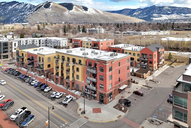 birds eye view of property featuring a mountain view