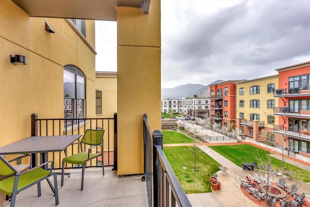 balcony featuring a mountain view