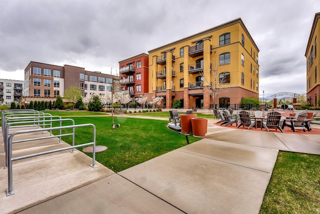 view of property's community with a yard